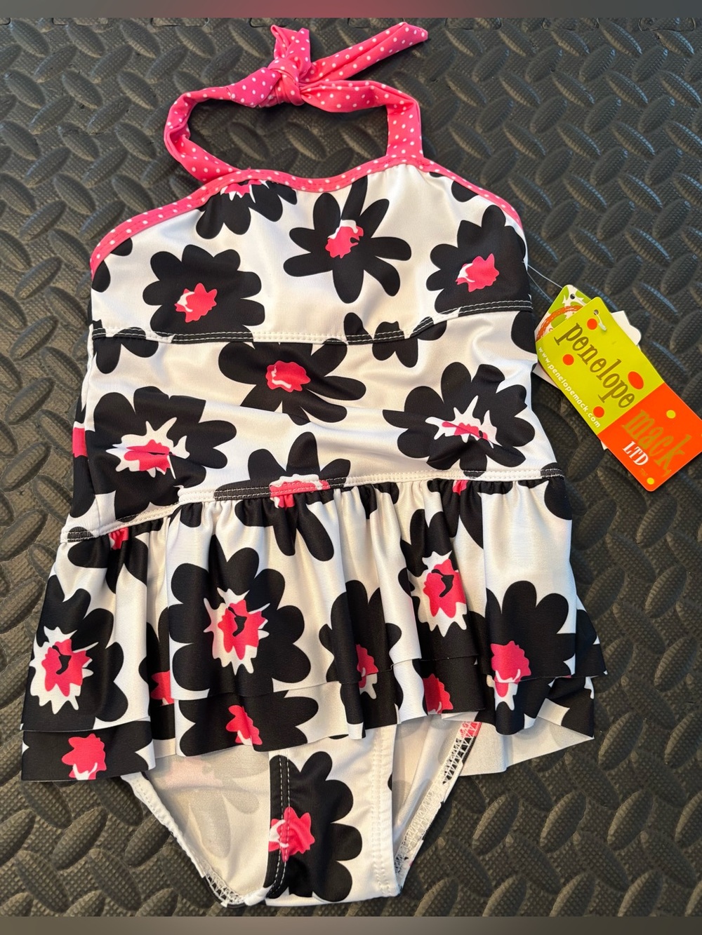 Penelope Mack White Swim Suit with Black Floral and Pink Trim, Size 5.